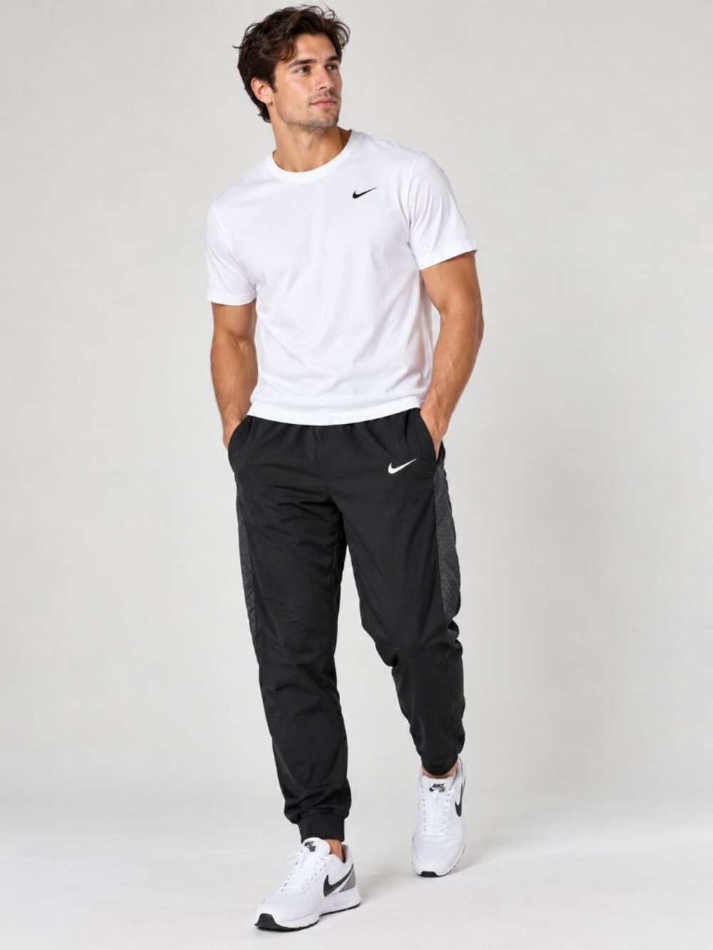 Nike Men’s Black Jogger Sweatpants with White Swoosh
